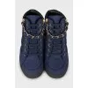 Textile sneakers decorated with chain