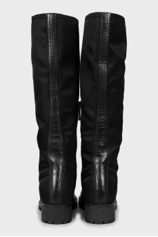 Black boots made of leather and textile