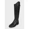 Leather boots with branded embossing