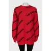 Wool sweater in signature print