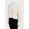 Cashmere sweater decorated with flowers