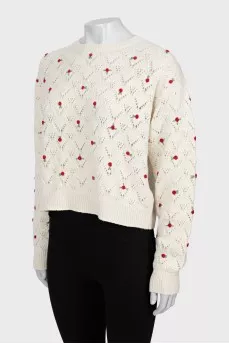 Cashmere sweater decorated with flowers