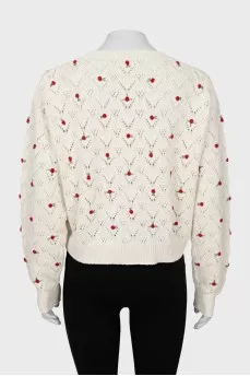 Cashmere sweater decorated with flowers