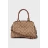 Crossbody bag in signature print