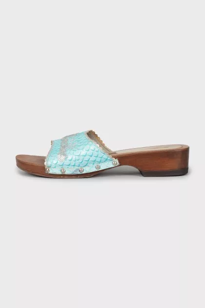 Wooden slippers decorated with sequins