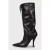 Leather boots with zipper and tag