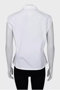 White sleeveless blouse