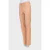 Wool trousers with arrows
