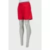 Men's red shorts with tag