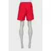 Men's red shorts with tag