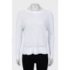 White pullover with perforations