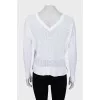 White pullover with perforations