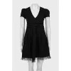 Black mini dress with polka dots