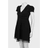 Black mini dress with polka dots