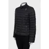 Black jacket with oblique zipper