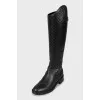 Black boots with embossed leather