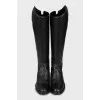 Black boots with embossed leather