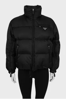 Black jacket with drawstrings at the bottom
