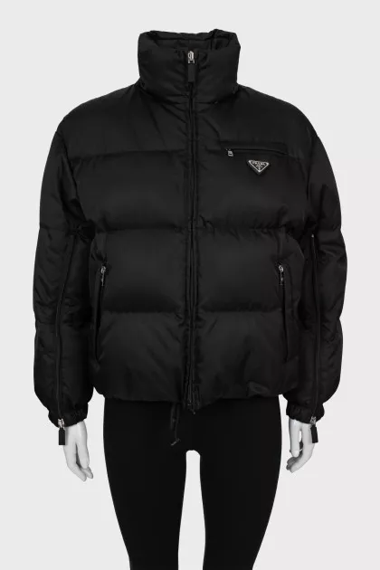 Black jacket with drawstrings at the bottom
