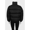Black jacket with drawstrings at the bottom