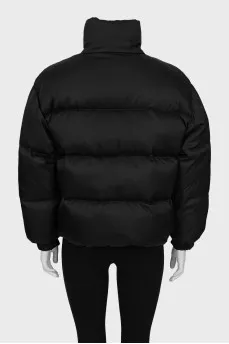Black jacket with drawstrings at the bottom