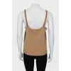 Knitted top with leather straps