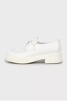 White leather loafers