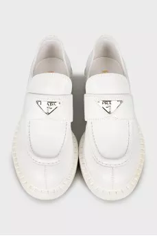 White leather loafers