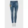 Distressed jeans with patches