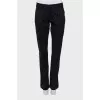 Straight trousers with raised seams