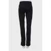 Straight trousers with raised seams