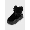 Insulated black leather boots
