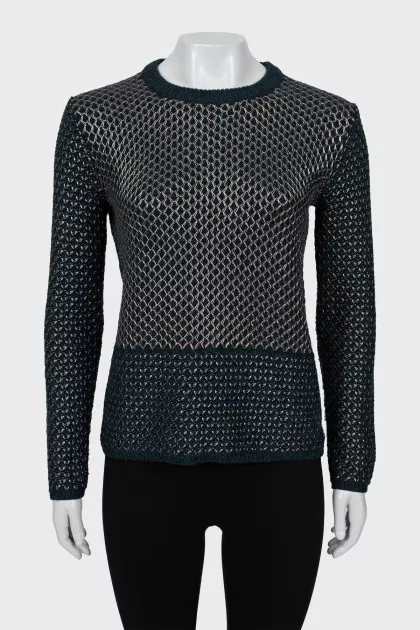 Knitted sweater decorated with weaving
