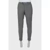 Men's gray trousers with arrows