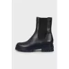 Leather boots with textile inserts