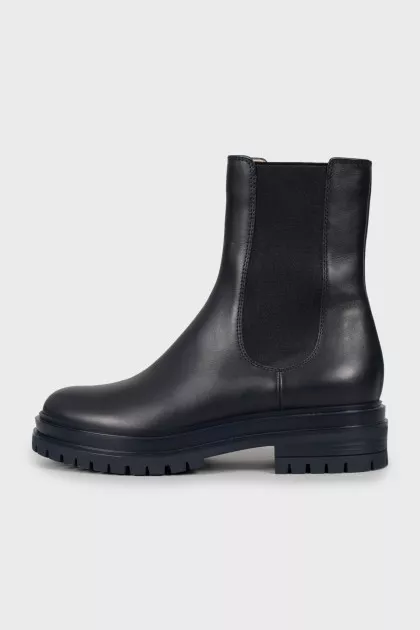Leather boots with textile inserts