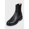Leather boots with textile inserts