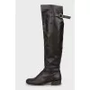 Leather boots decorated with buckle