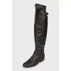 Leather boots decorated with buckle