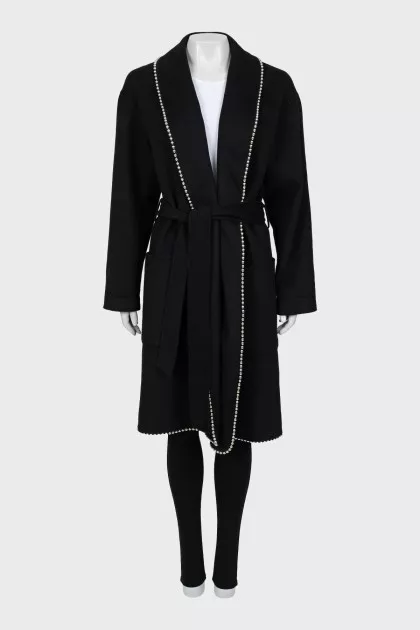 Black coat decorated with beads