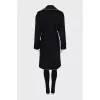 Black coat decorated with beads
