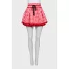 Red mini skirt in check print