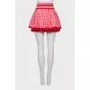 Red mini skirt in check print
