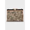 Textile clutch with beaded embroidery