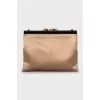 Textile clutch with beaded embroidery