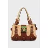 Combination bag with metal logo