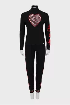 Knitted suit decorated with rhinestones