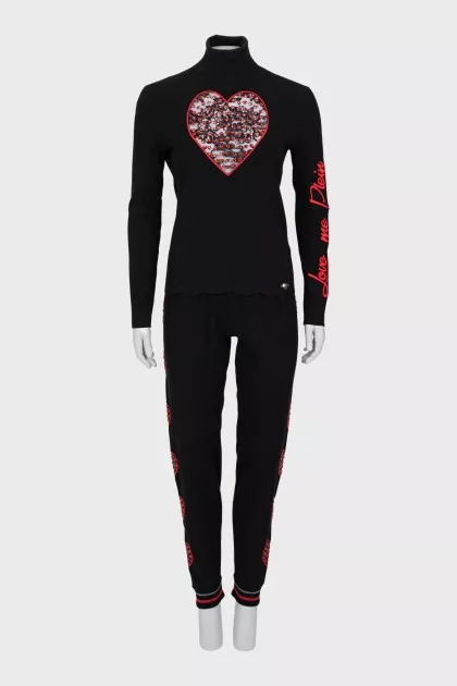 Knitted suit decorated with rhinestones