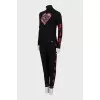 Knitted suit decorated with rhinestones