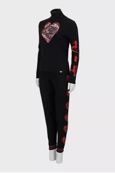 Knitted suit decorated with rhinestones